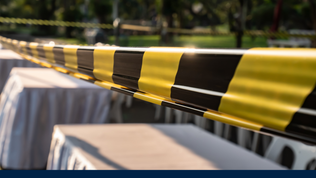 Image shows a close up of a road barricade