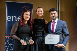 Image of award recipients collecting their award