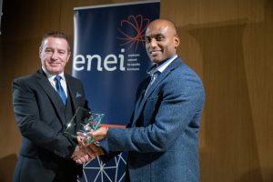 Image of award recipients collecting their award