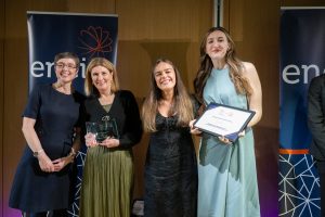 Image of award recipients collecting their award