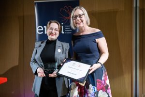 Image of award recipients collecting their award