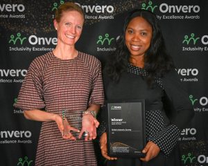 Image of two colleagues from British Antarctic Survey with their trophy and certificate.